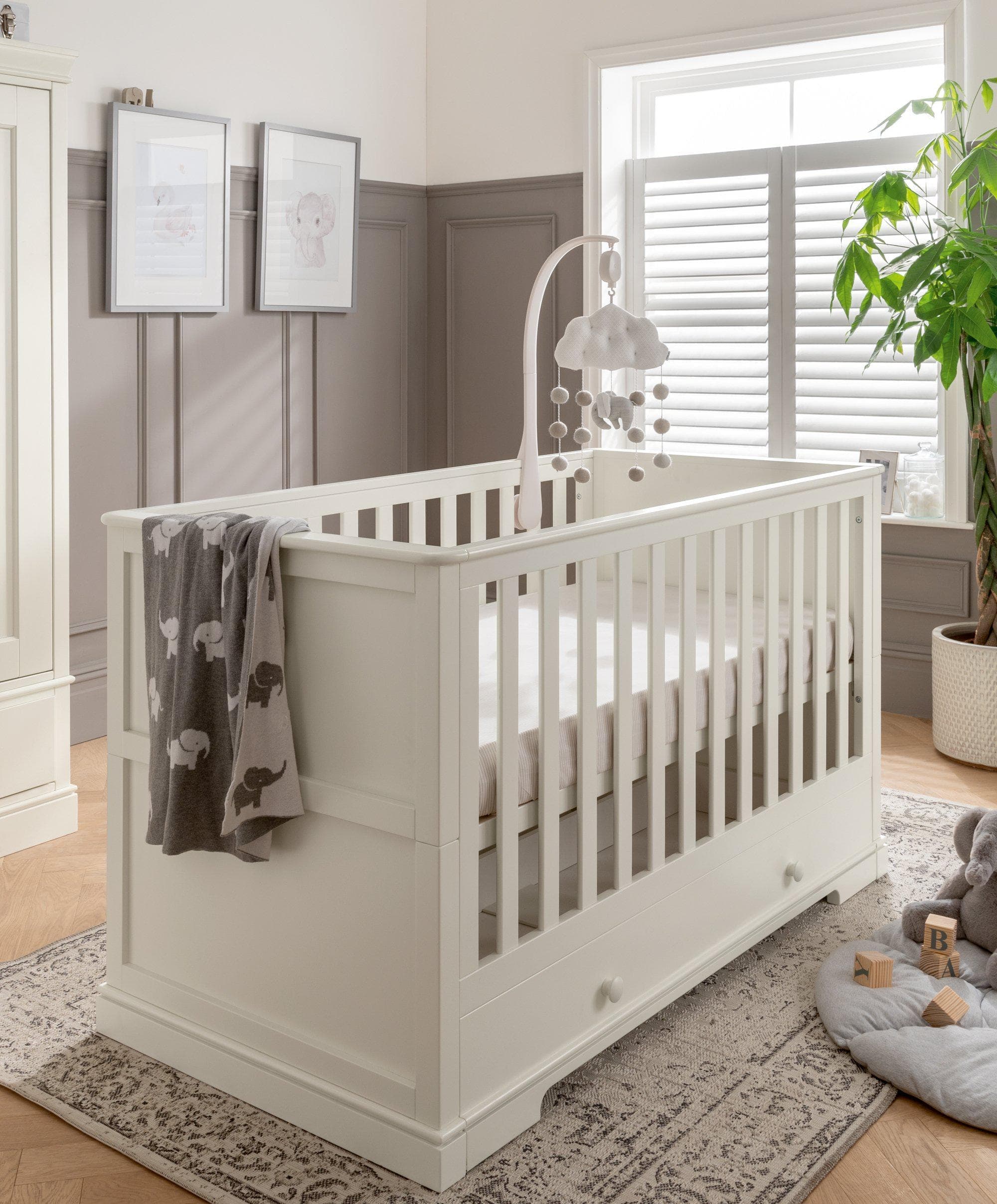 https://www.mamasandpapas.ie/cdn/shop/products/mamas-papas-cot-beds-oxford-baby-cot-bed-pure-white-30887240204448.jpg?v=1636452675